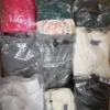 The photo shows a package with clothing in the category D.