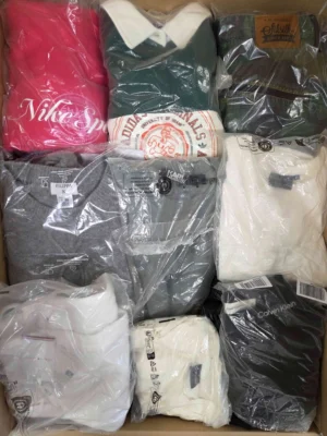 The photo shows a package with clothing in the category D.