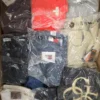 The photo shows a package with clothing in the category D.