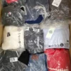 The photo shows a package with clothing in the category D.
