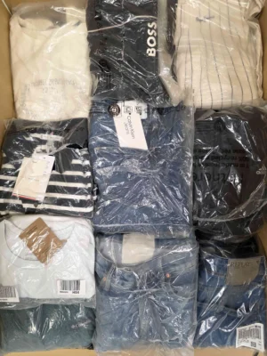 The photo shows a package with clothing in the category D.