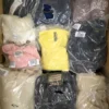 The photo shows a package with clothing in the category D.