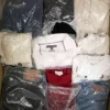 The photo shows a package with clothing in the category D.