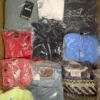 The photo shows a package with clothing in the category D.