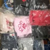 The photo shows a package with clothing in the category D.