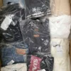 The photo shows a package with clothing in the category D.
