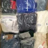 The photo shows a package with clothing in the category D.