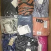 The photo shows a package with clothing in the category A.