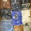 C1940 1 The photo shows a package with clothing in the category C.