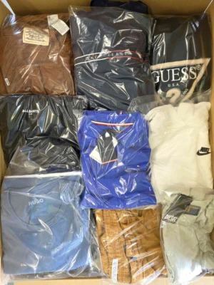 The photo shows a package with clothing in the category C.
