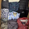 The photo shows a package with clothing in the category U.