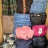 The photo shows a package with clothing in the category U.