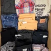 The photo shows a package with clothing in the category U.