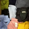 The photo shows a package with clothing in the category U.