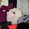 The photo shows a package with clothing in the category U.