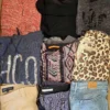 The photo shows a package with clothing in the category U.