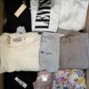 The photo shows a package with clothing in the category U.