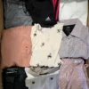The photo shows a package with clothing in the category U.
