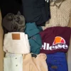 The photo shows a package with clothing in the category U.