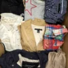 The photo shows a package with clothing in the category U.