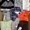 The photo shows a package with clothing in the category U.