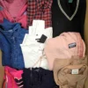 The photo shows a package with clothing in the category U.