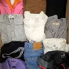 The photo shows a package with clothing in the category U.