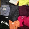 The photo shows a package with clothing in the category U.