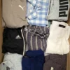 The photo shows a package with clothing in the category U.