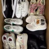 The photo shows a package with footwear in the category SH.