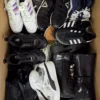 The photo shows a package with footwear in the category SH.