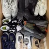 The photo shows a package with footwear in the category SH.