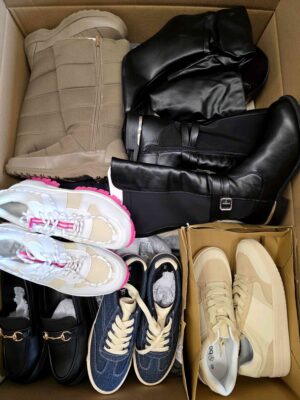 The photo shows a package with clothing in the category BPS.