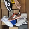 The photo shows a package with footwear in the category BS.