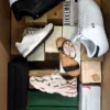The photo shows a package with footwear in the category BS.