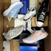 The photo shows a package with footwear in the category BS.