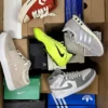 The photo shows a package with footwear in the category BS.