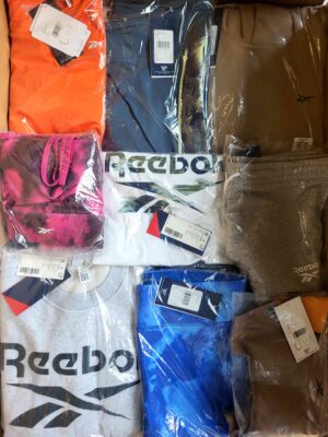 The photo shows a package with clothing in the category R.