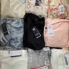The photo shows a package with clothing in the category B.