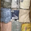 GB420 1 The photo shows a package with clothing in the category B.