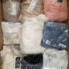GB423 1 The photo shows a package with clothing in the category B.