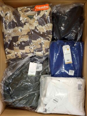 The photo shows a package with clothing in the category AJS.