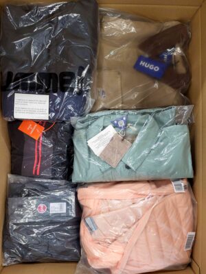 The photo shows a package with clothing in the category AJS.