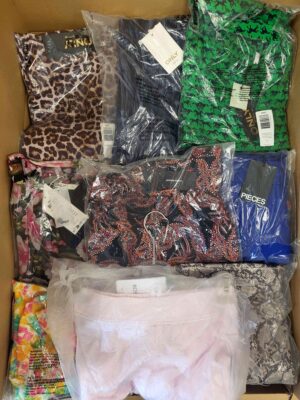 The photo shows a package with clothing in the category AR.