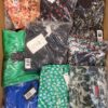 The photo shows a package with clothing in the category AR.