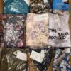 The photo shows a package with clothing in the category AR.