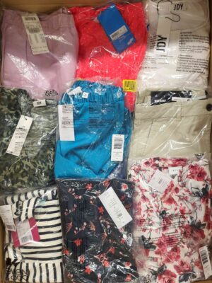 The photo shows a package with clothing in the category AR.