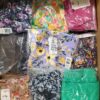 The photo shows a package with clothing in the category AR.