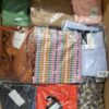 The photo shows a package with clothing in the category AR.
