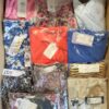 The photo shows a package with clothing in the category AR.